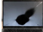Black spots on laptop screen repair Montreal